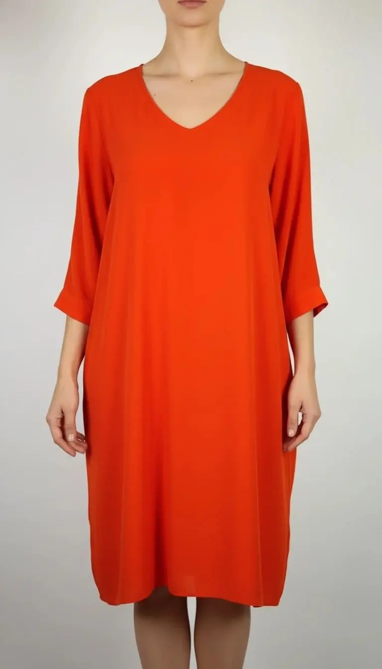 تونیک زنانه استوک کد ۶۸۱ | رنگ نارنجی روشن با آستین سه‌ربع و فرم آزاد سایز ۳۶–۳۸ | زرماه گالری