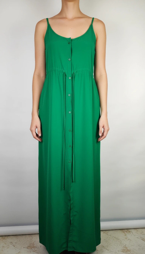 پیراهن زنانه استوک وارداتی سبز، بدون آستین، یقه ساده، قد بلند و فرم آزاد، مناسب استایل روزمره و مهمانی، روی تن مدل با پسزمینه روشن.