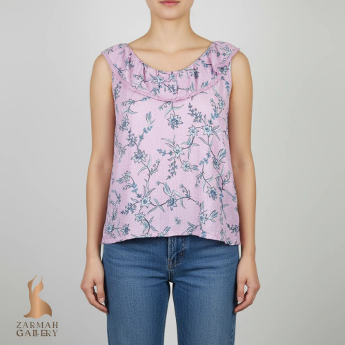تاپ زنانه وارداتی استوک طرحدار بنفش روشن، بدون آستین، یقه گرد، تنخور راحت، مناسب سایز ۴۰ تا ۴۲، مناسب استفاده روزمره.