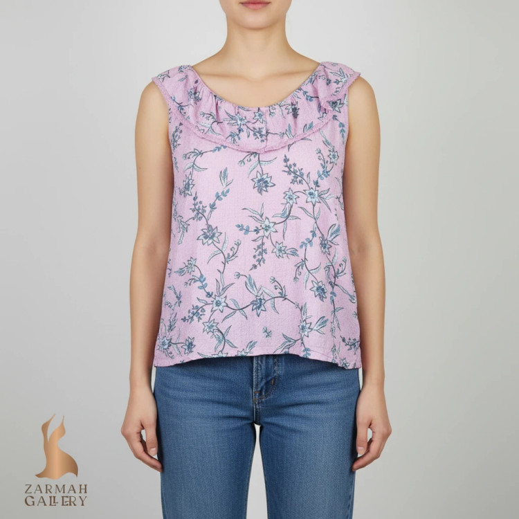 تاپ زنانه وارداتی استوک طرحدار بنفش روشن، بدون آستین، یقه گرد، تنخور راحت، مناسب سایز ۴۰ تا ۴۲، مناسب استفاده روزمره.