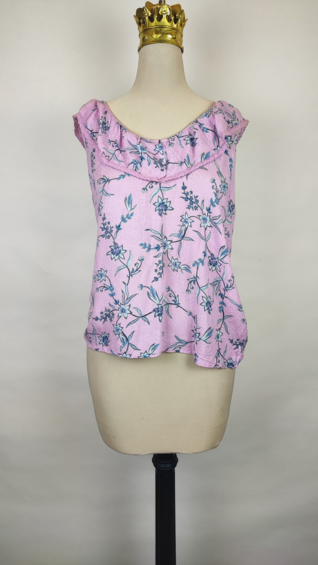 تاپ زنانه وارداتی استوک طرحدار بنفش روشن، بدون آستین، یقه گرد، تنخور راحت، مناسب سایز ۴۰ تا ۴۲، مناسب استفاده روزمره.