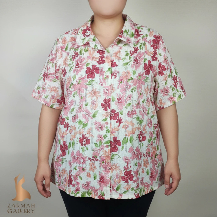 شومیز زنانه وارداتی استوک طرحدار گلدار، آستین کوتاه، تنخور آزاد، مناسب سایز ۴۸ تا ۵۰، استایل روزمره و راحت.