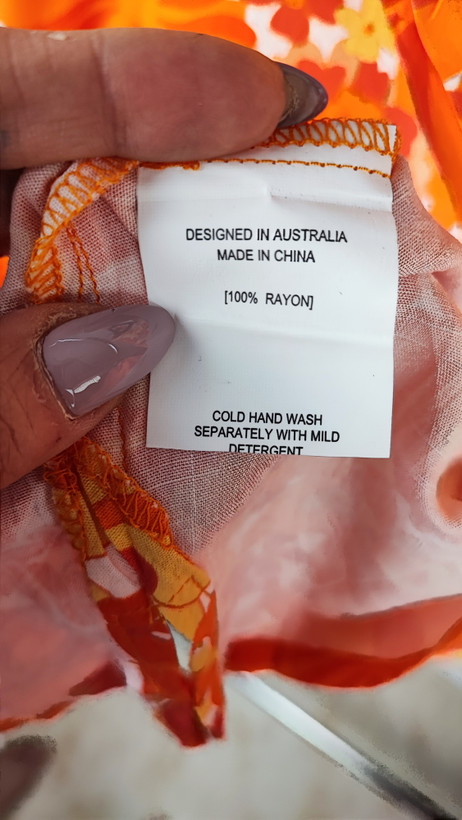 شومیز زنانه سایز بزرگ طرحدار گلدار رنگ نارنجی و خردلی کد ۱۸۱۷ * نمای تنخور: مدل شومیز دکمهدار آستین بلند نخی مناسب سایز ۴۸ و ۵۰ استوک اروپایی