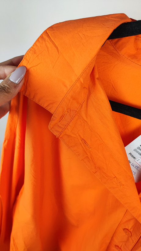 شومیز زنانه سایز بزرگ ساده رنگ نارنجی جیبدار کد ۱۸۳۹ * نمای تنخور: مدل شومیز نخی دکمهدار زنانه مناسب سایز ۵۶ و ۵۸ با قد پشت بلند استوک اروپایی