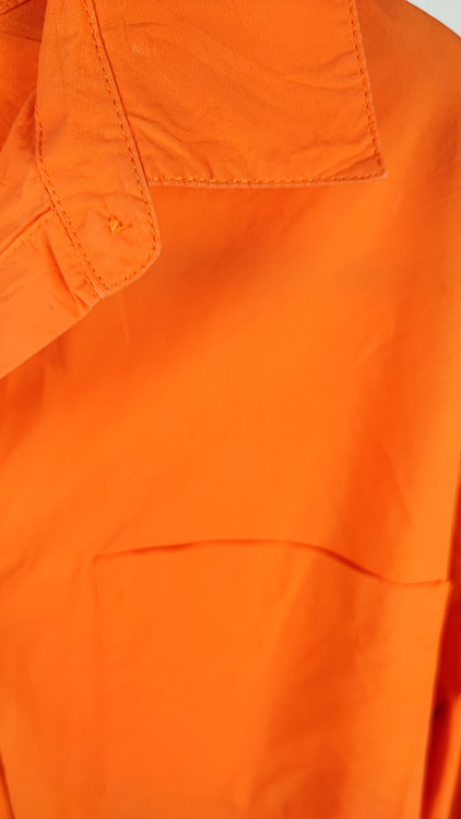 شومیز زنانه سایز بزرگ ساده رنگ نارنجی جیبدار کد ۱۸۳۹ * نمای تنخور: مدل شومیز نخی دکمهدار زنانه مناسب سایز ۵۶ و ۵۸ با قد پشت بلند استوک اروپایی