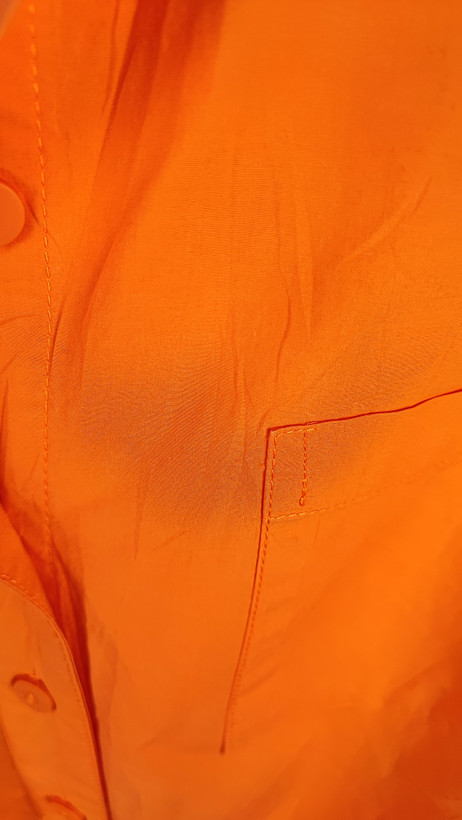 شومیز زنانه سایز بزرگ ساده رنگ نارنجی جیبدار کد ۱۸۳۹ * نمای تنخور: مدل شومیز نخی دکمهدار زنانه مناسب سایز ۵۶ و ۵۸ با قد پشت بلند استوک اروپایی