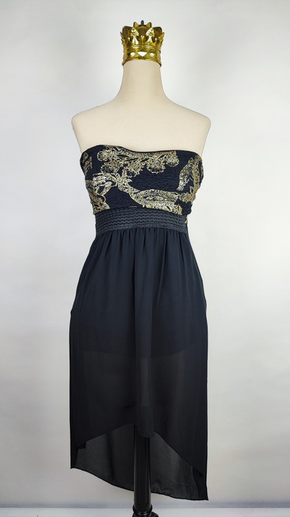 پیراهن مجلسی زنانه سرمهای و سفید طرحدار با قد نامتقارن و یقه رومی کد ۱۰۳۲ ۴. توضیحات محصول و راهنمای سایز