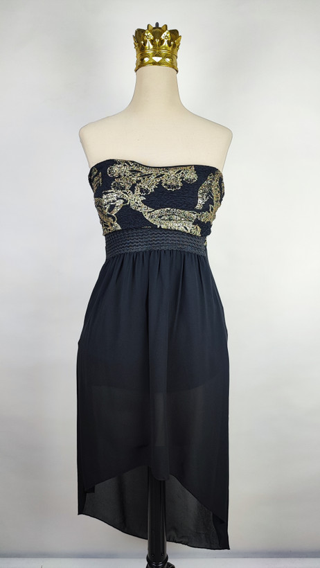 پیراهن مجلسی زنانه سرمهای و سفید طرحدار با قد نامتقارن و یقه رومی کد ۱۰۳۲ ۴. توضیحات محصول و راهنمای سایز