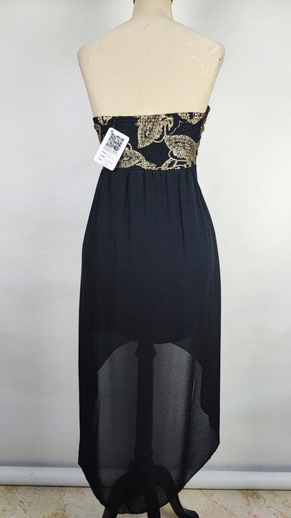 پیراهن مجلسی زنانه سرمهای و سفید طرحدار با قد نامتقارن و یقه رومی کد ۱۰۳۲ ۴. توضیحات محصول و راهنمای سایز