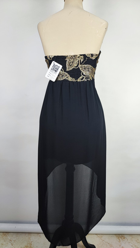 پیراهن مجلسی زنانه سرمهای و سفید طرحدار با قد نامتقارن و یقه رومی کد ۱۰۳۲ ۴. توضیحات محصول و راهنمای سایز