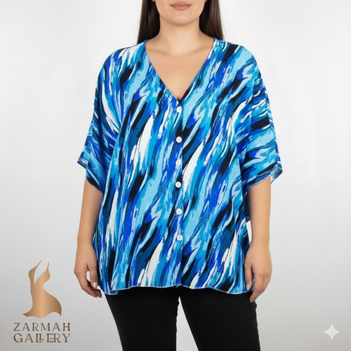 شومیز زنانه آستین کیمونو آبی طرحدار برند CBR استوک اروپایی گرید A مناسب استایل کژوال و مهمانی