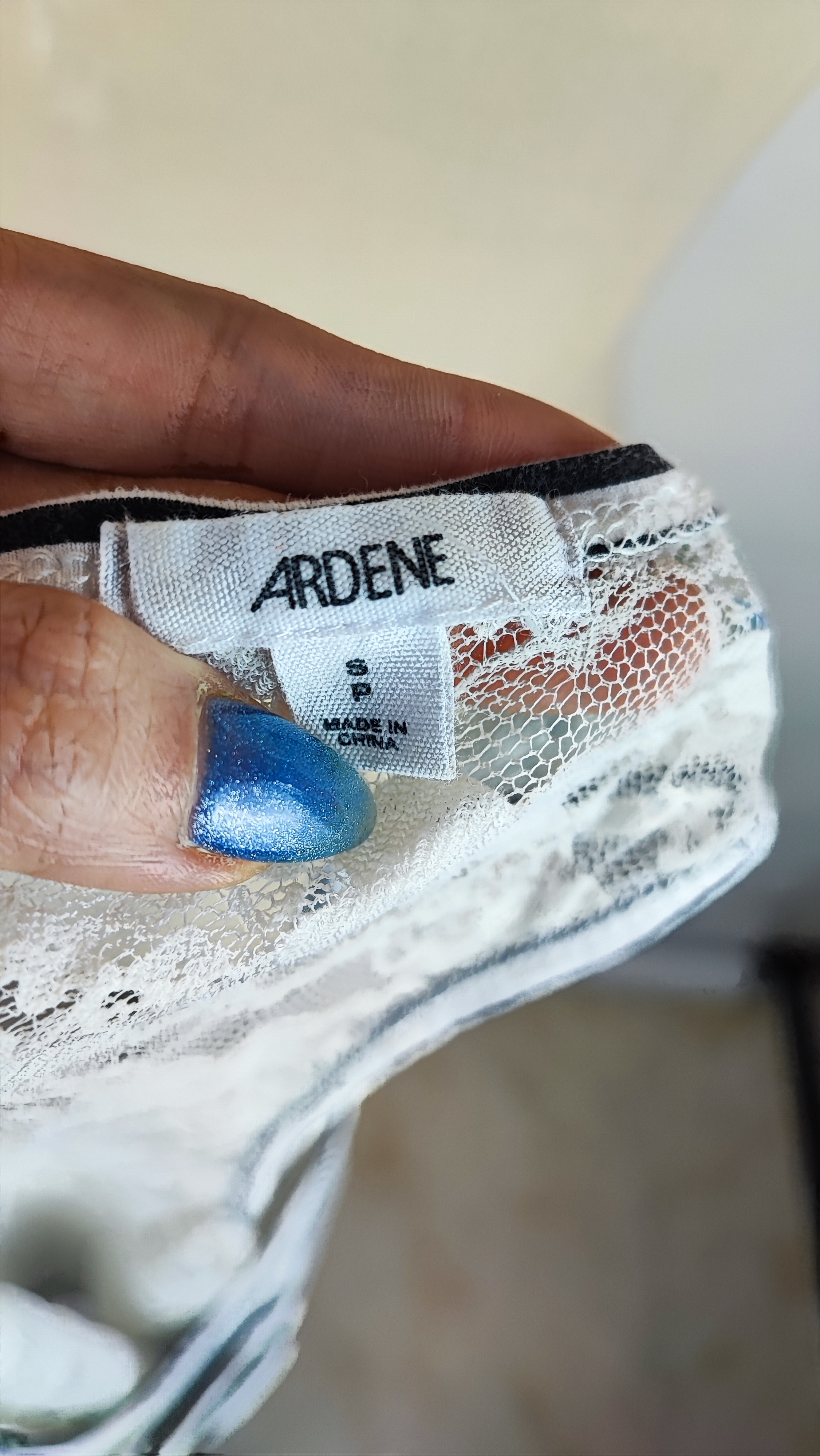 تاپ رکابی زنانه استوک وارداتی رنگ صورتی و نارنجی ملانژ مناسب سایز ۳۶ و ۳۸ استایل ورزشی و خانگی