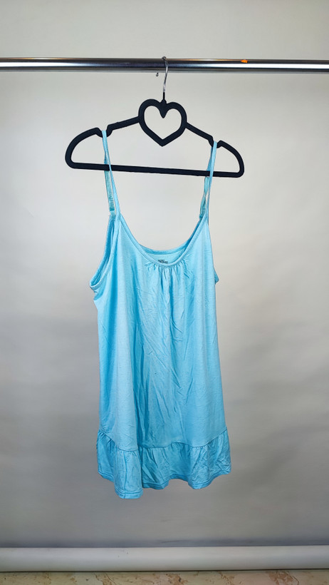 تاپ زنانه راحتی برند سکرت ترژرز رنگ آبی روشن مدل پایین چیندار استوک وارداتی