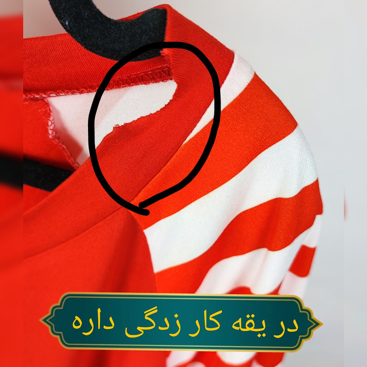 تیشرت زنانه سایز بزرگ برند شین رنگ قرمز با آستین راه راه استوک وارداتی مناسب استایل کژوال