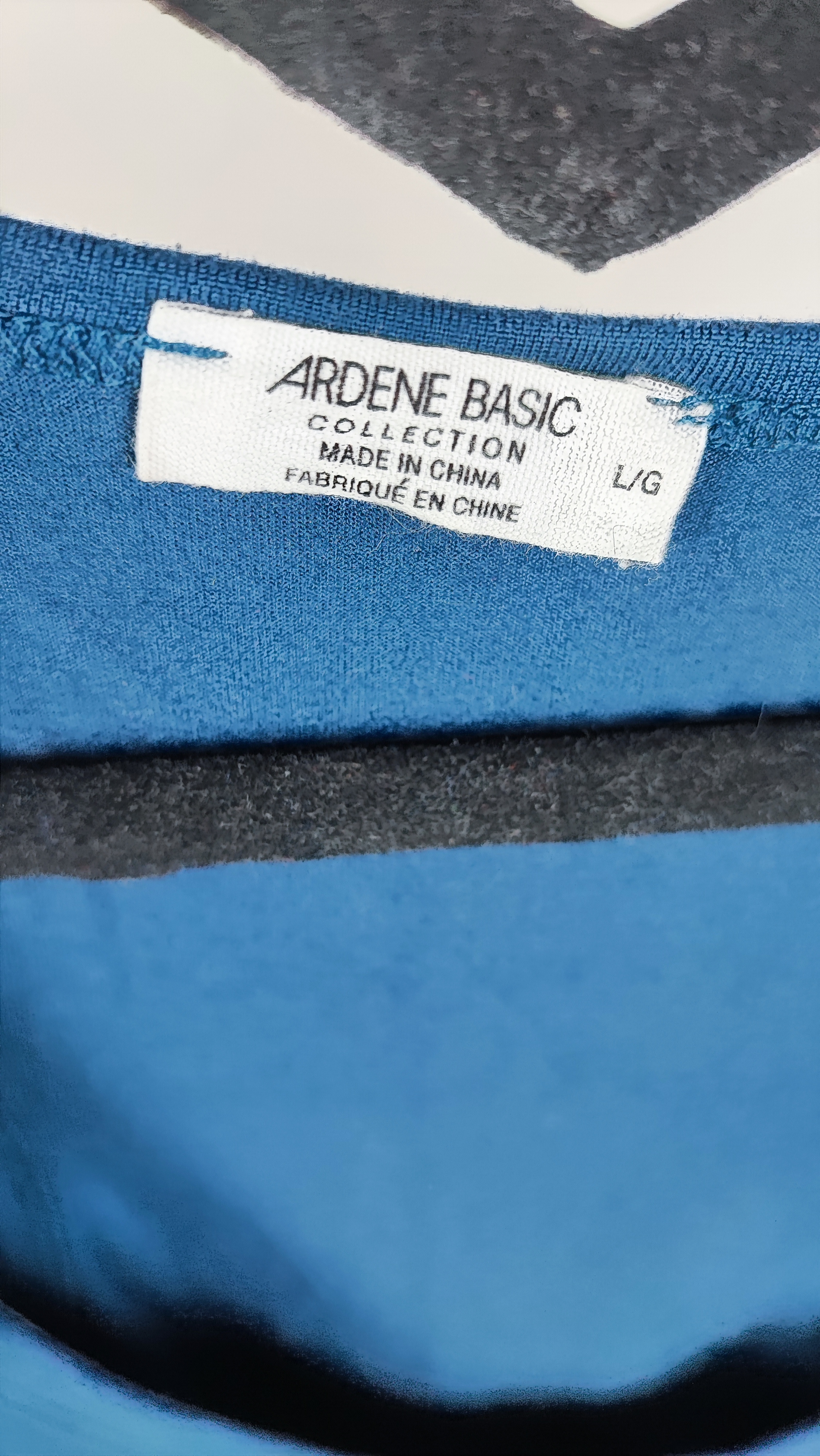 تاب آستین حلقهای زنانه وارداتی استوک برند اردن ARDENE رنگ آبی نفتی روی مانکن زرماه گالری