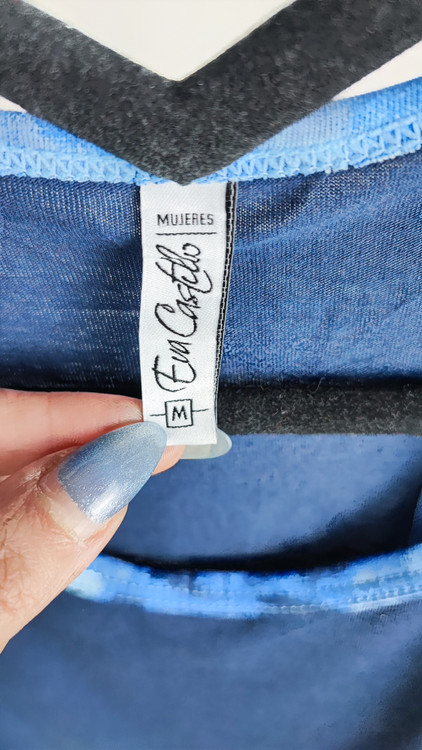 تاپ رکابی زنانه استوک وارداتی برند Eva Castillo رنگ سرمهای با یقه تزیینی آبی سایز مدیوم