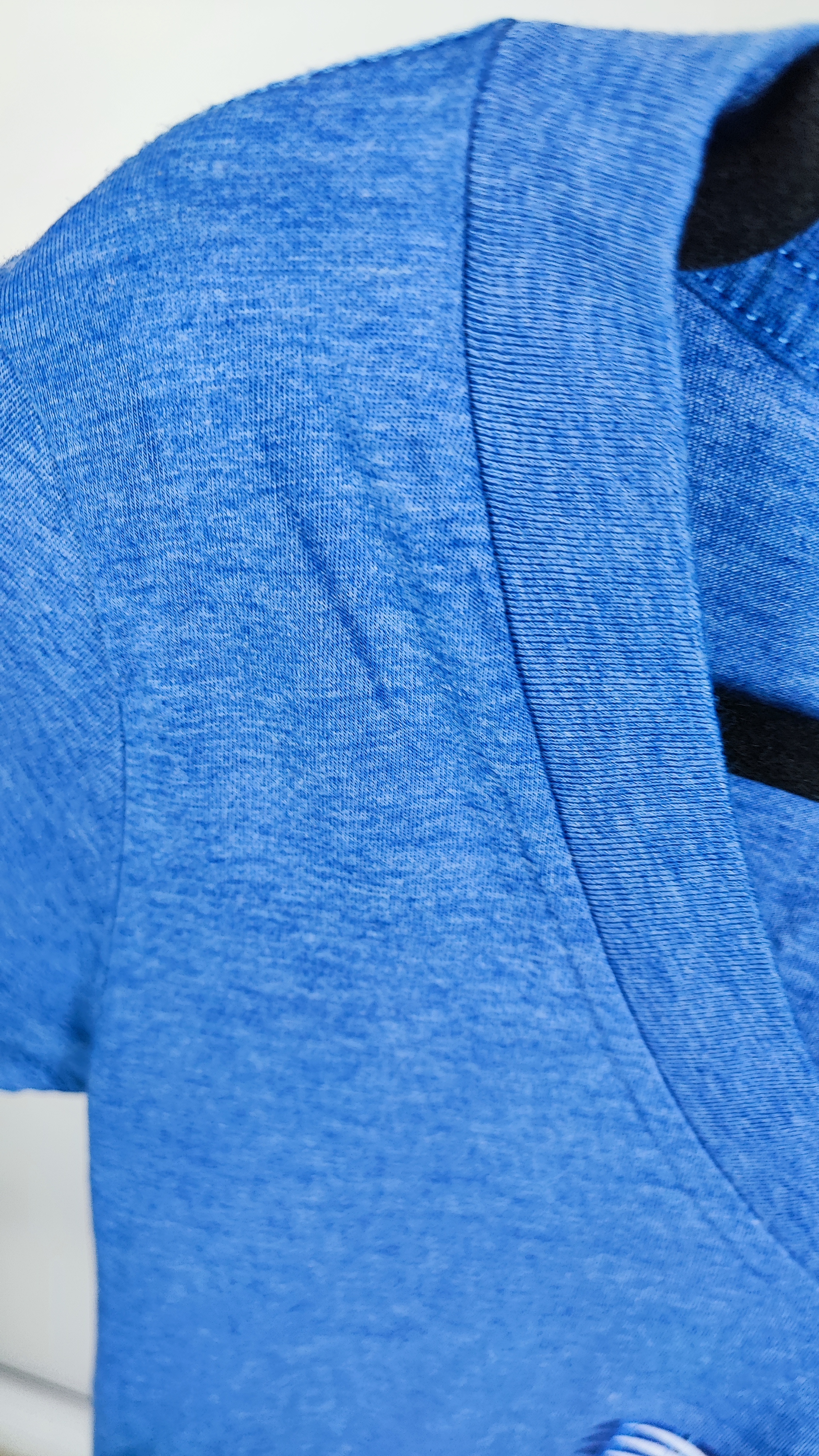 تیشرت زنانه یقه هفت برند Levelwear رنگ آبی ملانژ طرحدار استوک وارداتی گرید