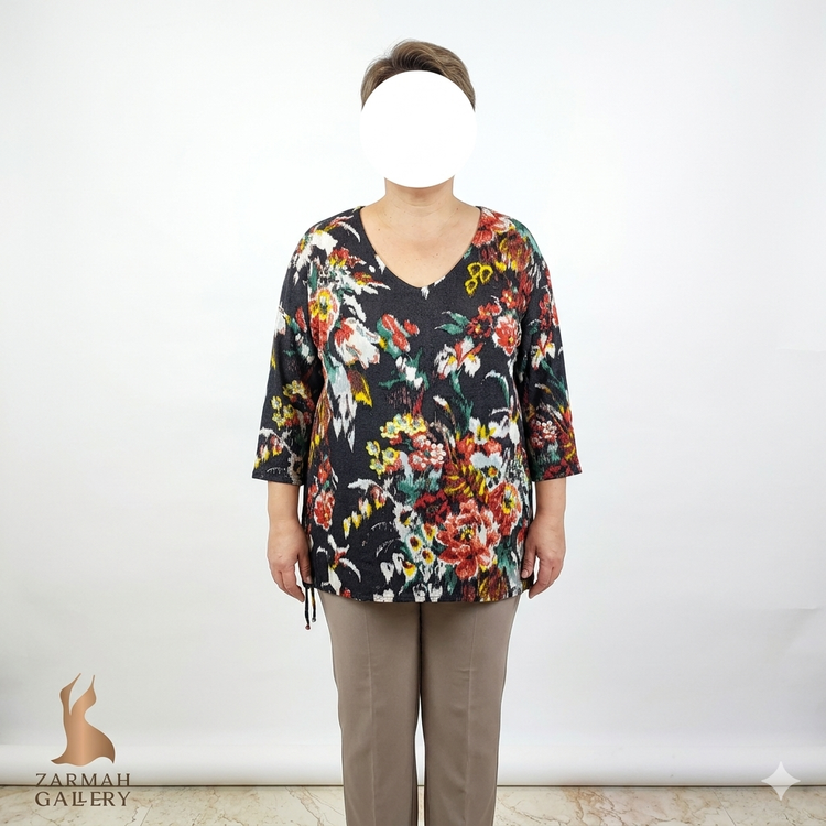 شومیز سایزبزرگ زنانه نخی برند رانچو استانسیا رنگ مشکی با گلهای رنگی درشت و آستین سه ربع موجود در زرماه گالری