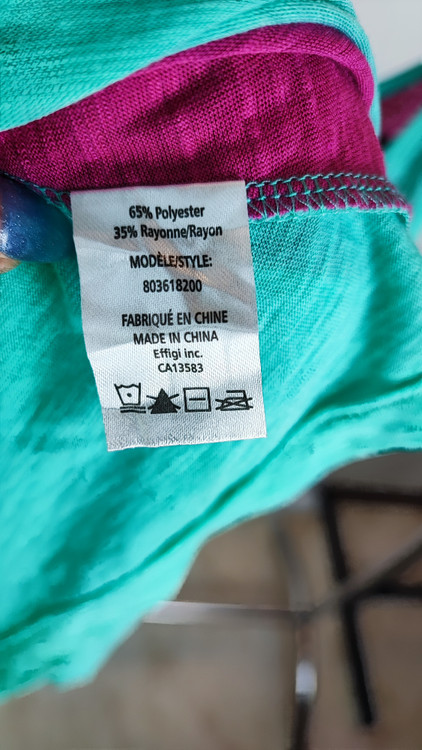 تاپ زنانه استوک اورجینال برند سرفیس رنگ صورتی و فیروزهای مناسب استایل اسپرت و روزمره