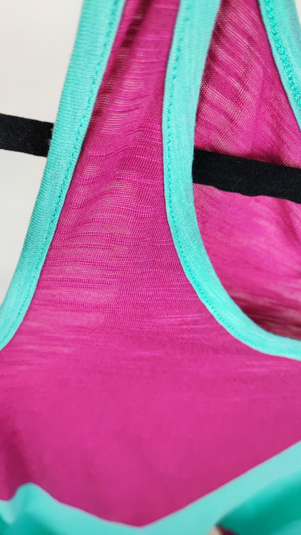 تاپ زنانه استوک اورجینال برند سرفیس رنگ صورتی و فیروزهای مناسب استایل اسپرت و روزمره