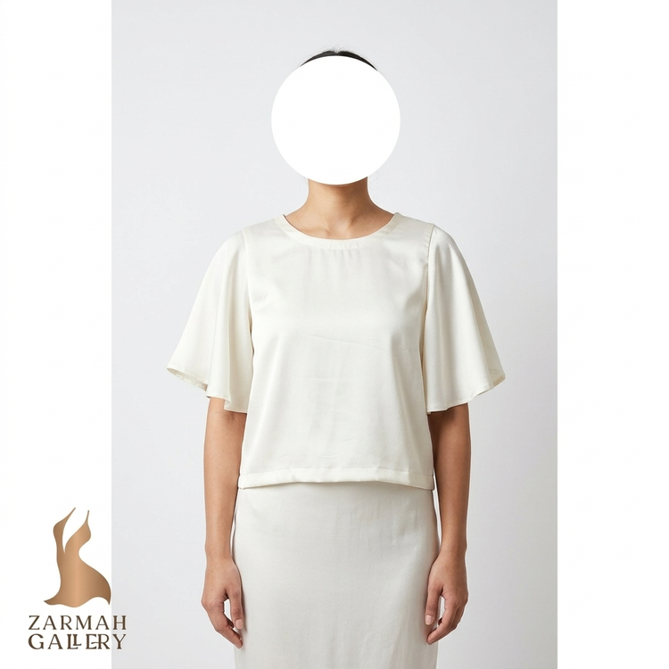 شومیز نیمتنه ساتن کرم شیری زنانه استوک وارداتی با آستین کلوش کوتاه و یقه گرد گالری زرماه