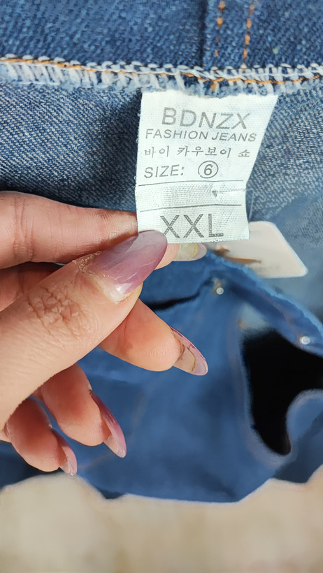 پیراهن جین ساسبندی زنانه وارداتی برند BDNZX کد ۱۰۳۱ مناسب استایل کژوال فروشگاه زرماه گالری