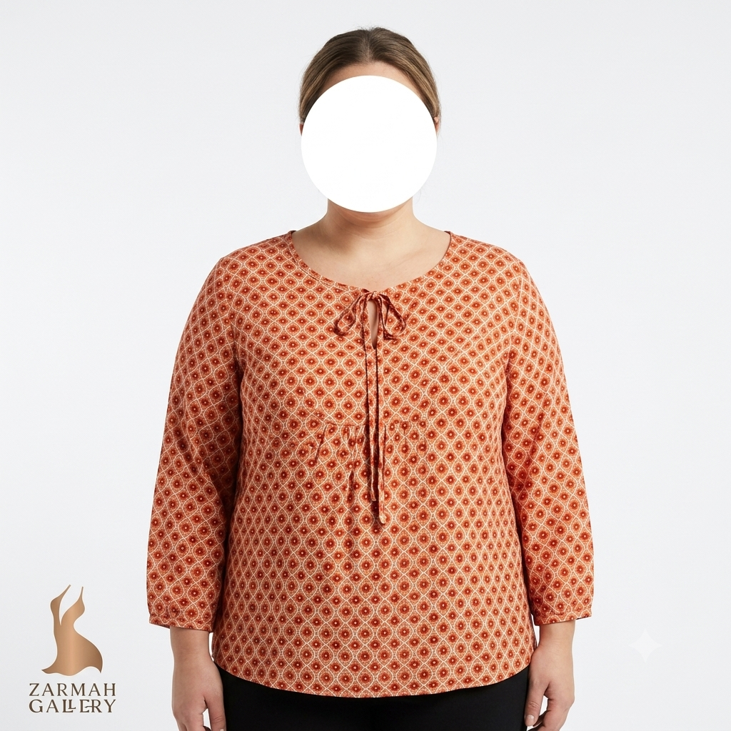 شومیز سایز بزرگ زنانه استوک وارداتی رنگ نارنجی آجری طرح دار یقه گرد بند دار گره ای آستین سه ربع لبه کش دار
