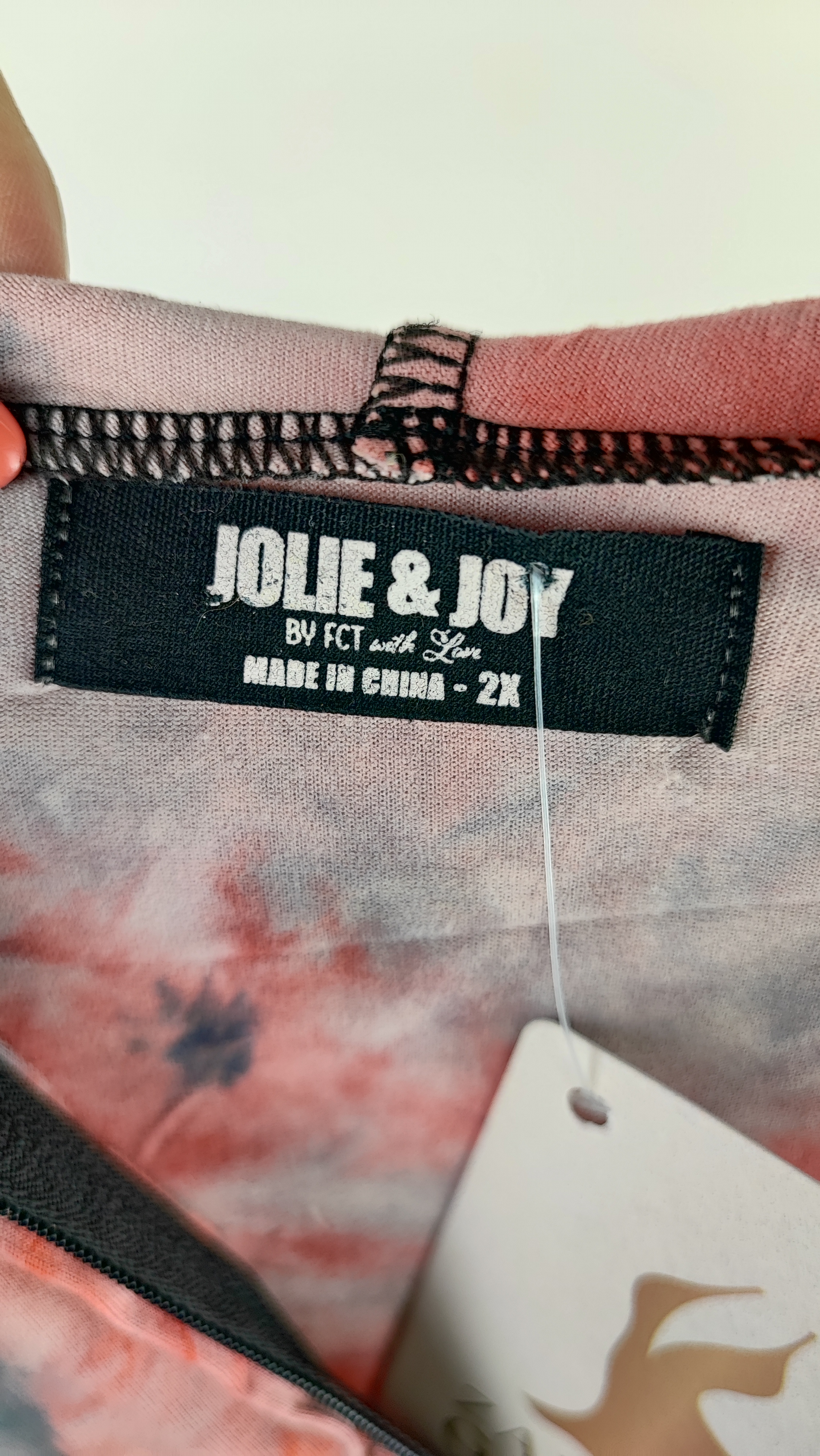 سویشرت زنانه سایز بزرگ جلو زیپدار با طرح تایدای رنگی برند جولی اند جوی (Jolie & Joy)، مناسب استایل کژوال