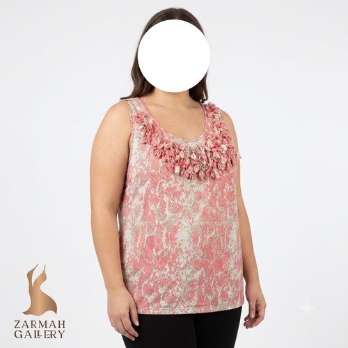 تاپ زنانه سایز بزرگ استوک وارداتی برند آی ان سی طرح دار رنگ صورتی و سفید مناسب استایل مهمانی