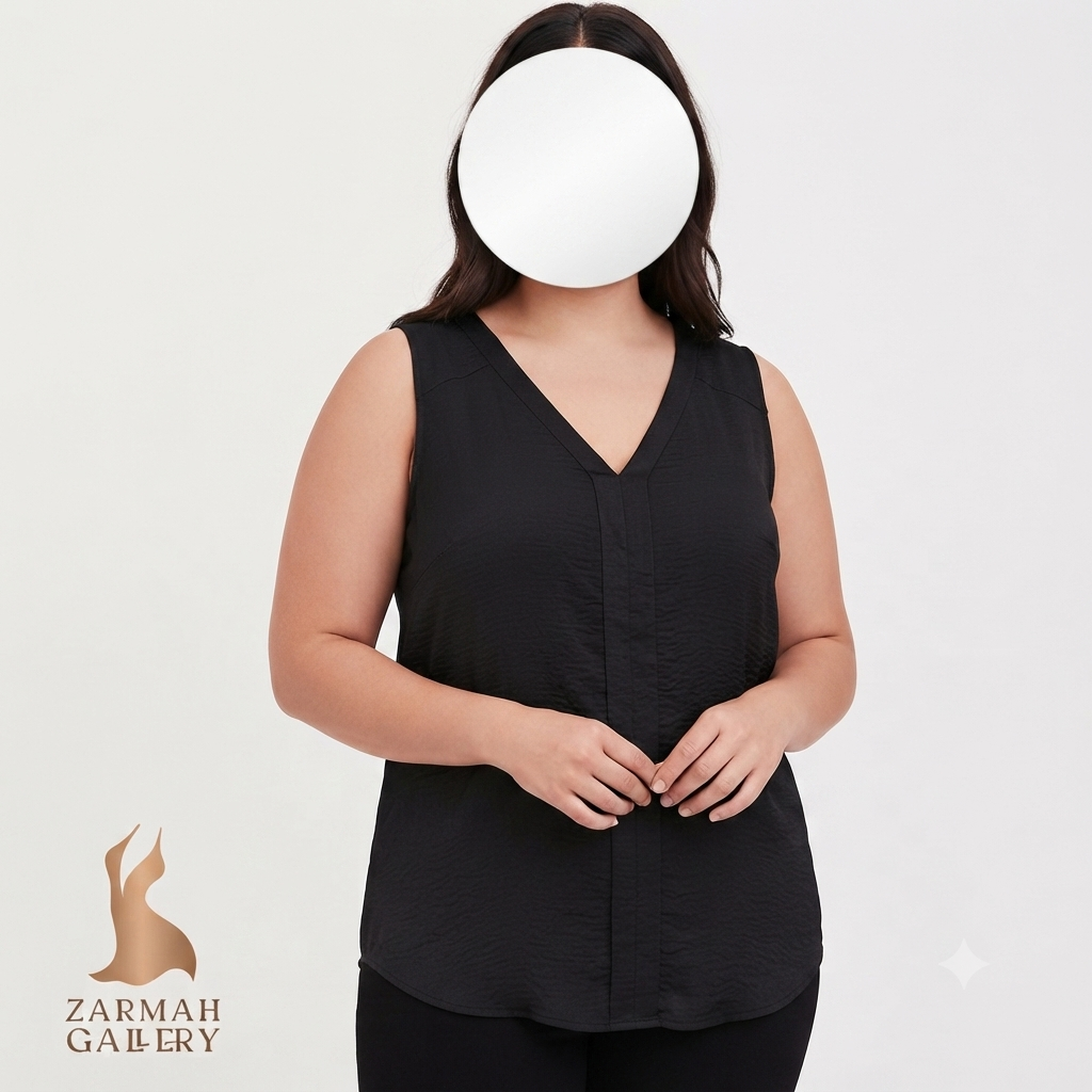 تاپ زنانه سایز بزرگ استوک وارداتی برند تورید رنگ مشکی مناسب استایل مهمانی و روزمره