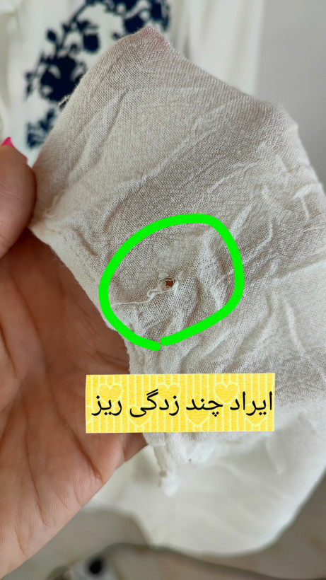 شومیز زنانه سایز بزرگ استوک برند امريکن ایگل رنگ شیری با گلدوزیهای سرمهای تیره و ایراد جزئی در یقه مناسب استایل بوهو و تابستانی
