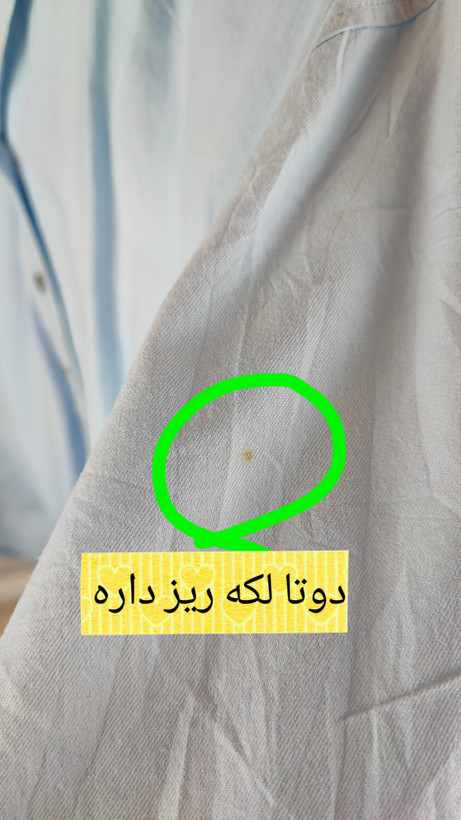 شومیز زنانه سایز بزرگ آبی روشن استوک اروپایی برند یونیورسال ترد دارای لکه جزئی سایز ۵۲ مناسب استایل روزمره